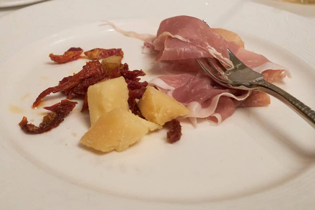 Disney Cruise Captains Gala Menu Aged Prosciutto Served with Sun-dried Tomatoes
